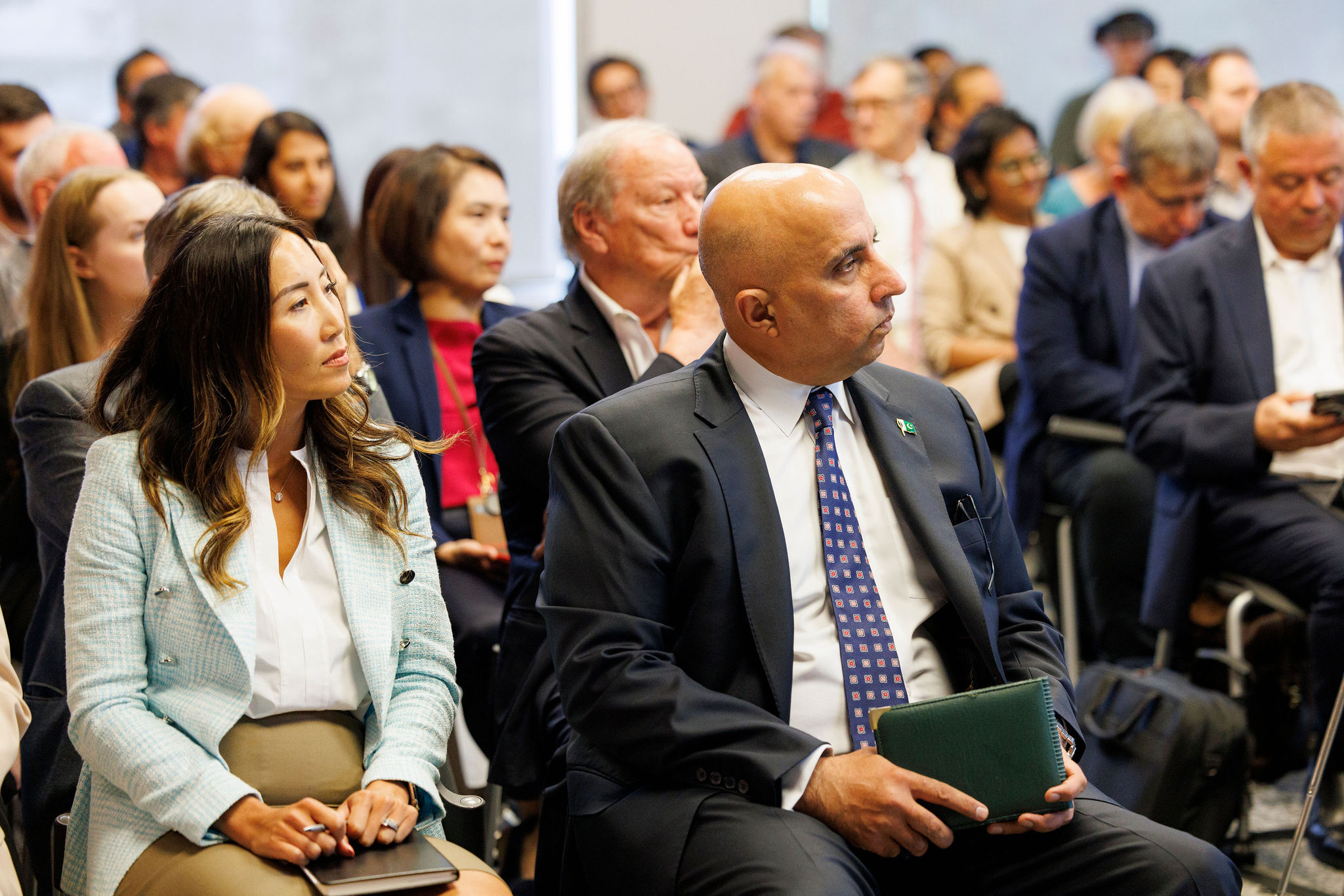 Audience members at event