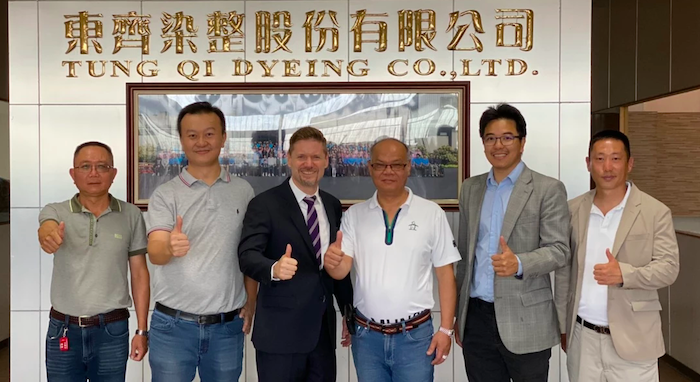 Ed Shim (second from left) and his partners in Taiwan.