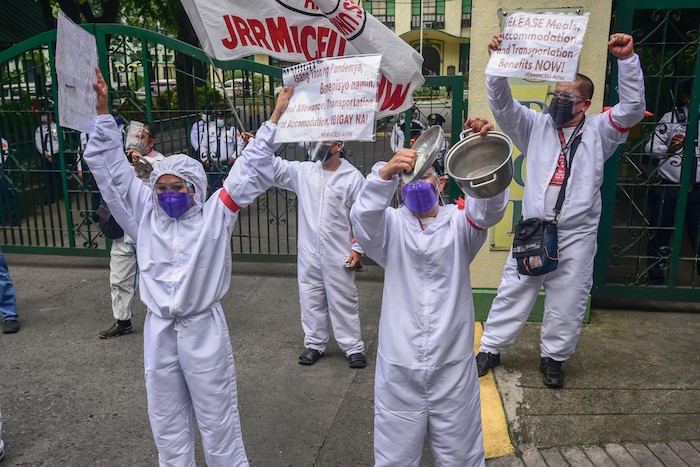 Philippine health workers at protest in 2021 