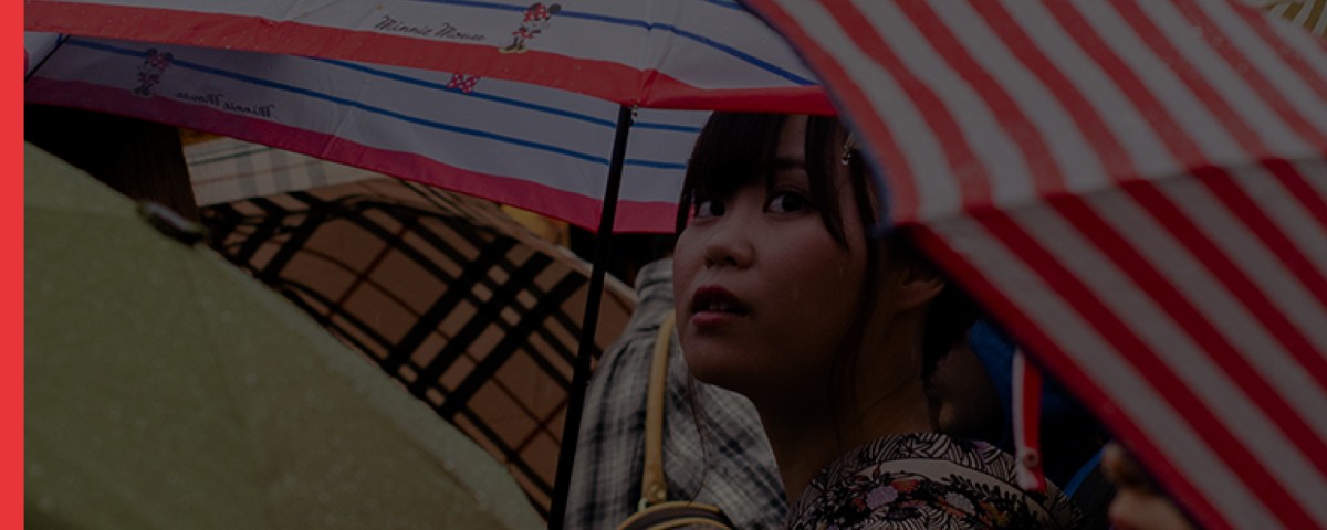 Closeup of woman under an umbrella 
