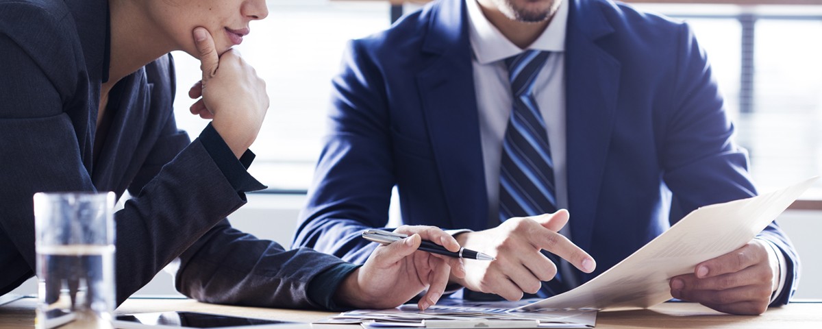 business people viewing documents