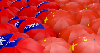 China and Taiwan flags on red umbrellas