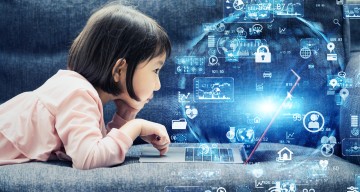 Girl looking at digital interface