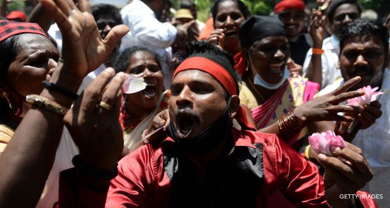 Men in India celebrate outcome in 2021 state elections 