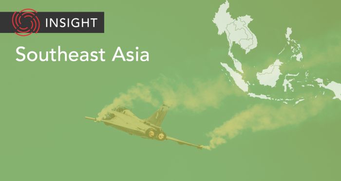 fighter jet over map of southeast asia 